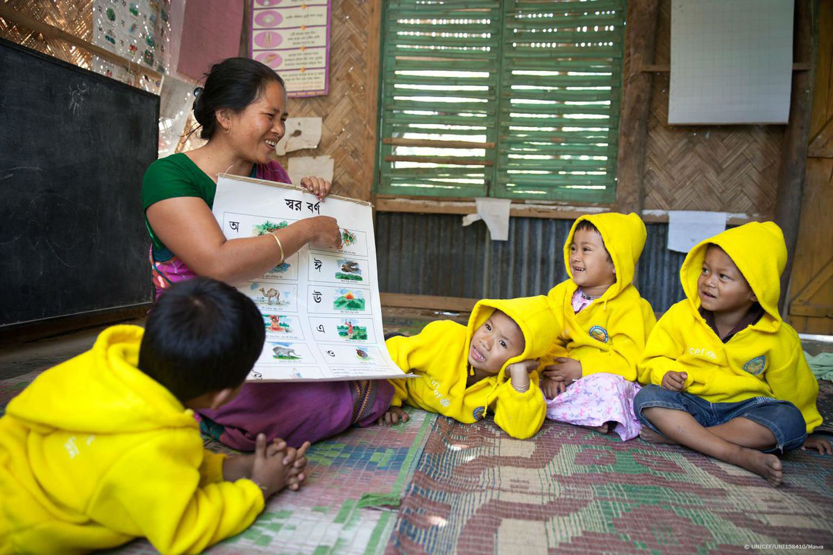 Toddlers in Bangladesh are introduced to the alphabet. 