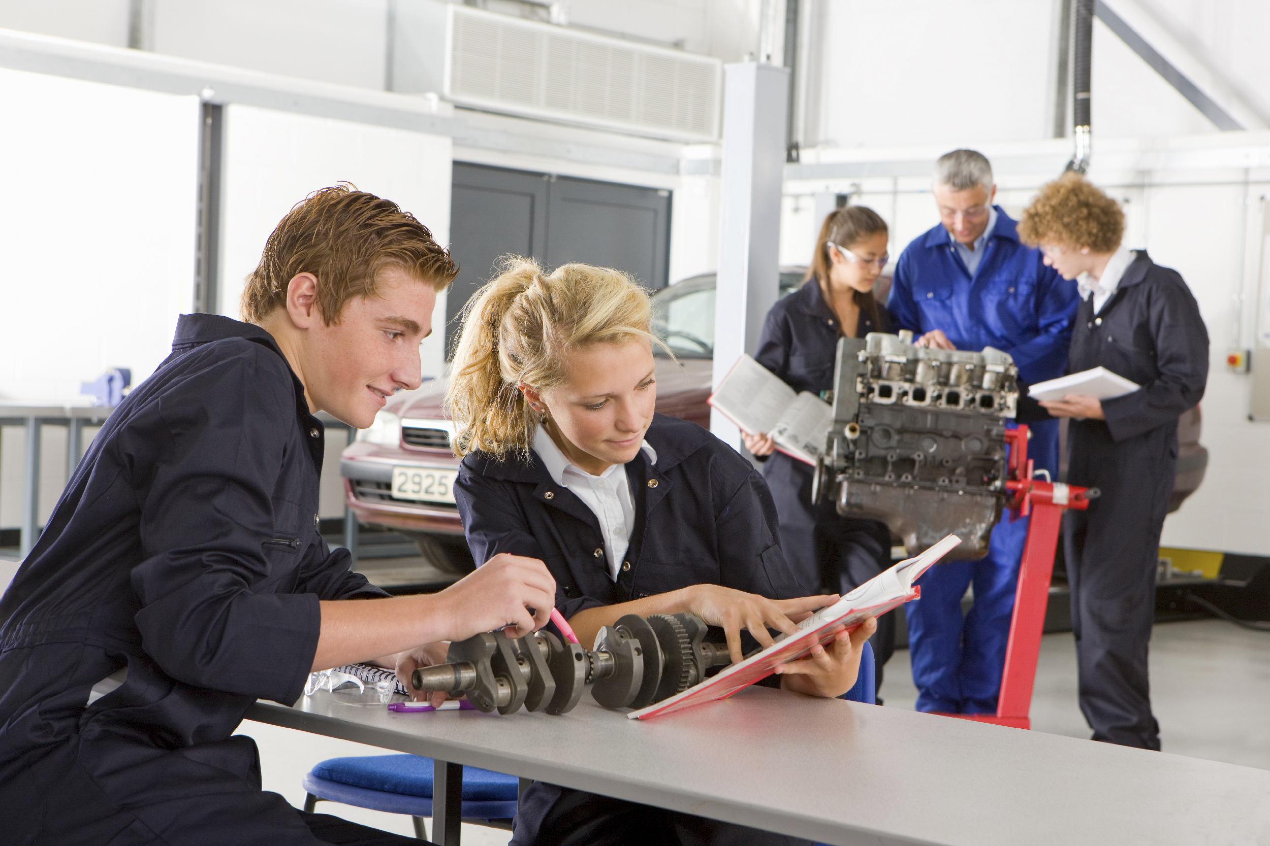 young people learning about mechanics